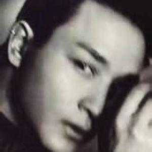 This is a photo of Hong Kong movie star Leslie Cheung He has passed away in 2003 Please attach this photo for Mr Leslie Cheung Please