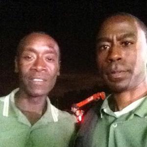 With Don Cheadle on the set of Iron Man 3.