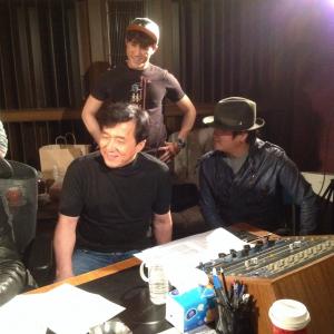 Jerry Liau working with Jackie Chan in the recording studio
