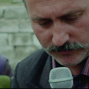 Still of Okan Avci and Muttalip Mujdeci in Sivas 2014