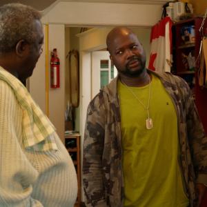 Still of Viv Leacock and Blu Mankuma in Fathers & Sons (2010)
