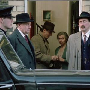 Still of Hugh Fraser and Philip Jackson in Agatha Christie's Poirot (1989)