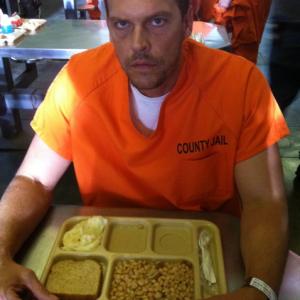 Josh Harp as Prisoner