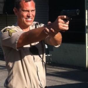 Josh Harp as Police Officer