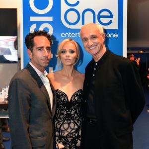 Producer J.B. Sugarman and actress Laura Vandervoort with Michael Gross at Cannes MIPCOM Festival, 2013.