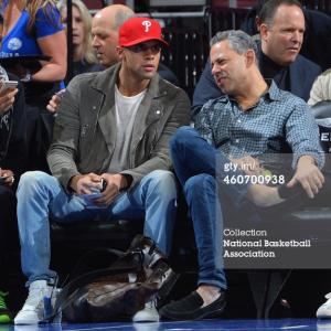Actor Matt Cook and Philadelphia 76ers owner, Art Wrubel sits courtside at Charlotte Hornets vs Philadelphia 76ers. Date: 12/19/2014 via FAHRENHEIT PR & S. BOOKER