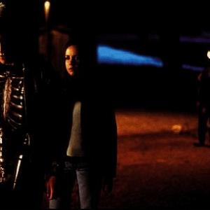 Still of Jake Gyllenhaal, Jena Malone and Holmes Osborne in Donnie Darko (2001)