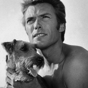 Clint Eastwood holding his pet dog circa 1960 Modern silver gelatin 14x11 estate stamped 600  1978 Wallace Seawell MPTV