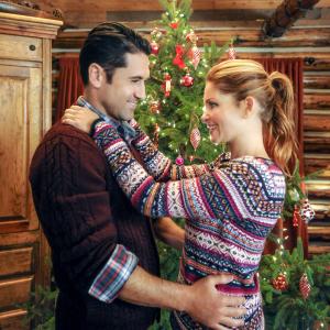 Still of Candace Cameron Bure and David ODonnell in Christmas Under Wraps 2014