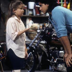 Still of John Stamos and Candace Cameron Bure in Full House 1987