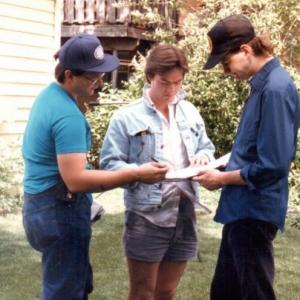 David Boles consulting with cinematographer and assistant director