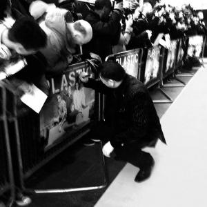 MEM FERDA  Signs Posters for Fans at the World Premiere of PLASTIC at Odeon West End on April 29 2014 in Londons Leicester Square