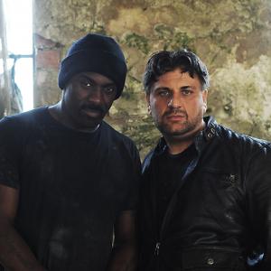 Idris Elba as Malcolm and Mem Ferda as Andriy : LEGACY (2010)