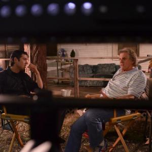 Jin Kelley talks with producer Henry Lange Jr on set