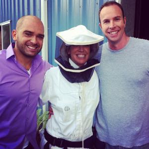 on set of Owners manual with the hosts keeping the makeup artist safe while filming with bees 