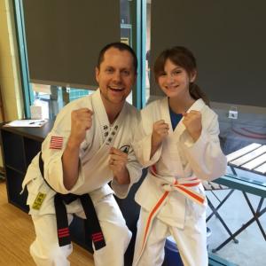 Brooke Liz with Karate Instructor Jason Knight after her 1st Belt testing