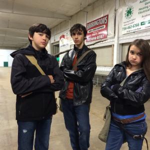 After making it to safety these three siblings get cleaned up and ready to protect on Necroland From left to right Joseph Jacob and Julia Kate Ouellette