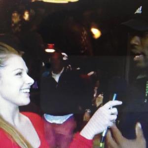 Mercedes Peterson interviewing former Pro Bowl American Football player Kwamie Lassiter at the Celebrity Invitational of Scottsdale Arizona