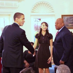 The Obamas, Giselle Bonilla,and Charles S. Dutton in: 