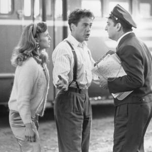 Still of Robert Downey Jr David Paymer and Kyra Sedgwick in Heart and Souls 1993