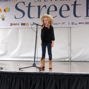 Singing solo at Santee Street Fair Bigger Isnt Better