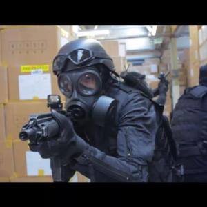 ARCHIE COCKER AS SWAT TAKEN FROM A FILM BY THE HAMILL BRO'S THE WRONG FLOOR