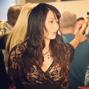 Linda Wang on the red carpet premiere of the film Blonde Squad