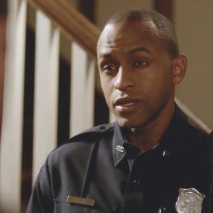 Drew Stephenson as Officer Carter on The USA Network series premiere of 