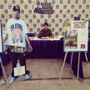 Photo of Ruben Najera signing autographs in his booth at the world famous San Diego Comic Con 2014.
