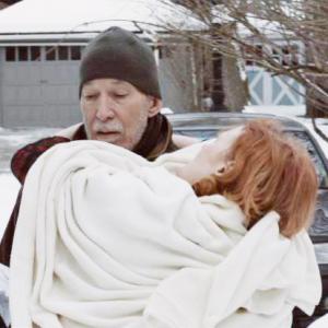 Paul (Harold Tarr) carrying Juliette (Susan Kirby) in the snow, during the filming of 'When?'. (2013)