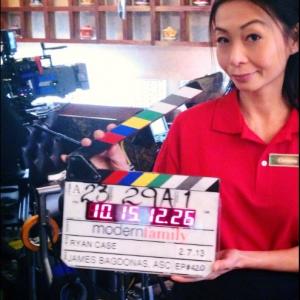 Sulinh Lafontaine on set of Modern Family as a Vietnamese Waitress