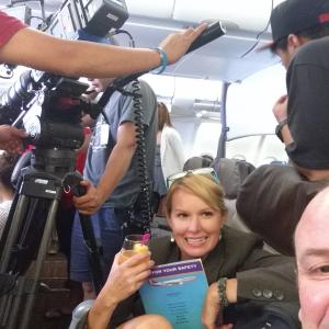 Scott M Schewe  Angel Kay Uherek on the set of Full House in Honolulu Hawaii Tight spaces for the cameraman and actors on this Hawaiian Airlines plane