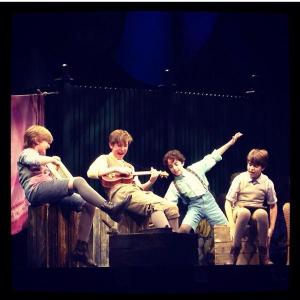 Chris and boys on stage in Broadways Finding Neverland