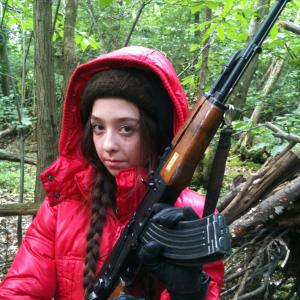 Anastasia Drew as Elena granddaughter of Russian General Kalashnikov Kalashnikov In The Woods By The Lake