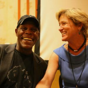 Katy Dore with Danny Glover sharing a laugh at the San Diego Native American Film Festival.