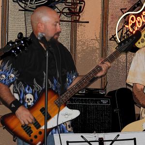 Playing bass guitar with my band The 4one9ers during our No Wahalla US Tour of North Dallas