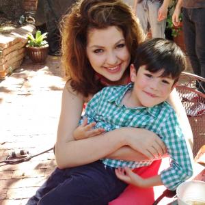 Celeste Buckingham and Mikhail Novick on set of her music video Unpredictable where Mikhail played her youngest son