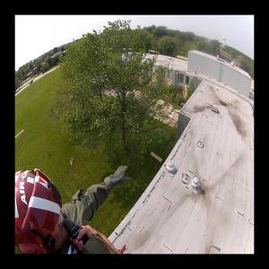 Photo was taken of Garret Kaminskis on approach for landing on the roof of the old Tinley Park, IL Medical Complex during an exercise.