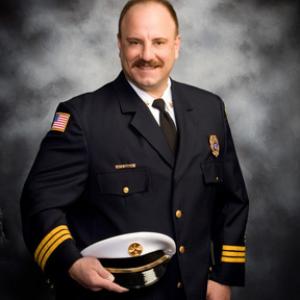 Photo was taken of Garret Kaminskis for official Fire Department Battalion Chief ID badge