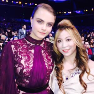 Actresses model Cara Delevingne and Alice Aoki attend The 2015 MTV Movie Awards at Nokia Theatre LA Live on April 12 2015 in Los Angeles California