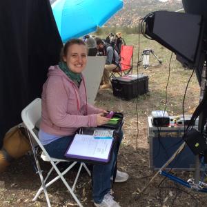 Roes at the monitor working as the script supervisor on feature film The Hike