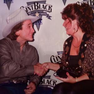 Entertainment reporter Kim Leslie interviews Country Music Star Clint Black