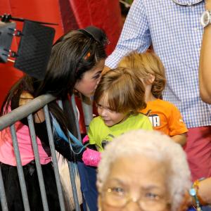 Alanis Sophia after her performance in the Tampa Family Health Fair meeting her fans