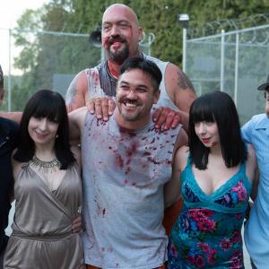 From left to right  Donald Munro Jen Soska Paul Big Show Wight Dean Cain Sylvia Soska and Kimani Smith on the set of Vendetta