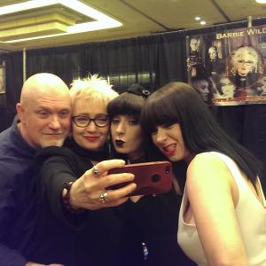 Sylvia (far right) and her twin sister, Jen (middle right), with Barbie Wilde (middle left), and Nicholas Vince (far left) at Texas Frightmare Weekend.