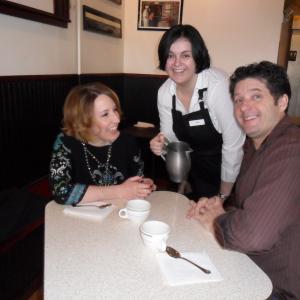 Restaurant scene with actors-Bouchard, Lucinda Rodrigues, and Michael Eck.