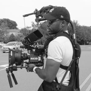 Louis Obioha on the set of the Pickings Concept Trailer.