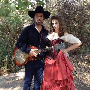 Luis Oliart and Lauren Alexandra Lewis on set for A Million Ways to Die music video