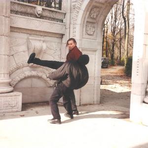 Mike Dawson aka Michael Dawson dispatches a kick to a hooded assailant while fight rehearsing on the Kung Fu The Legend Continues set Dawson performed well over 140 fight scenes on the show as David Carradines stunt double 1995