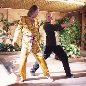 Michael Dawson works with David Carradine on the set of KungFu The Legend Continues 1993